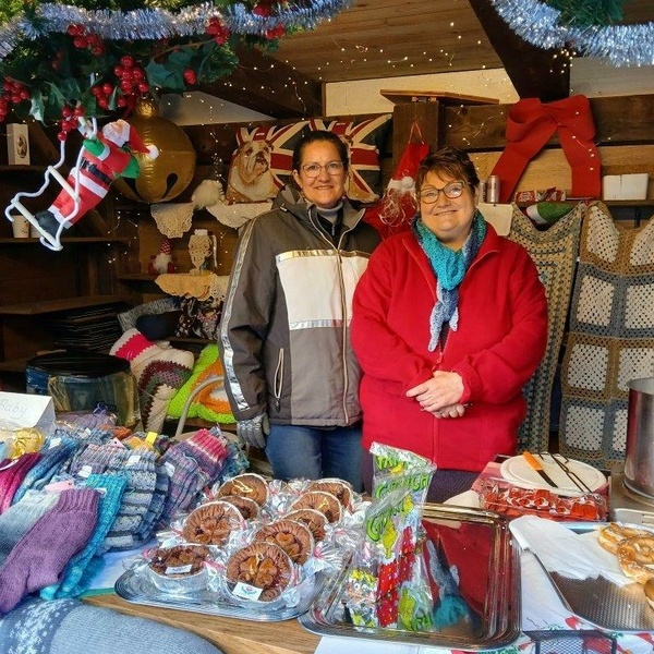 Cormann betreutes Wohnen an ihrem Verkaufsstand 